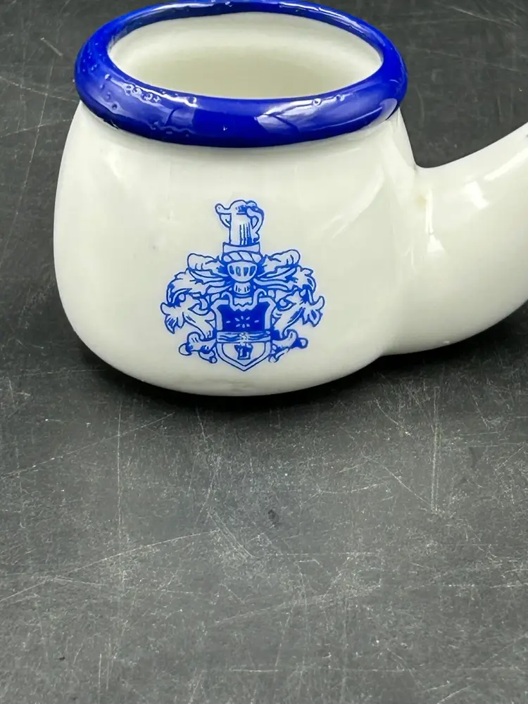 Vintage Small Blue And White Ceramic Pipe Figurine With Coat Of Arms Design