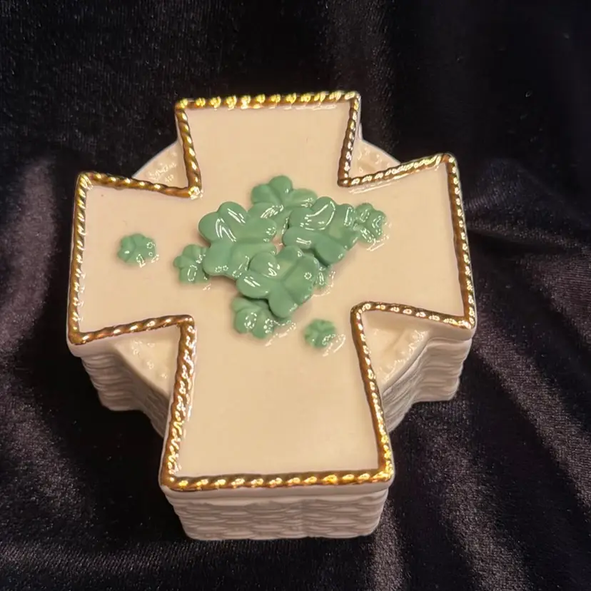 Vintage Irish Celtic Cross porcelain trinket box, featuring cream glazed porcelain, gold accents, and green shamrock embellishments. Ornate Belleek-style finish