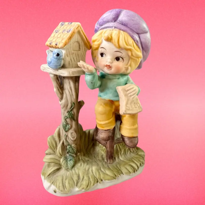 Boy Feeding Bird - Bisque Figurine