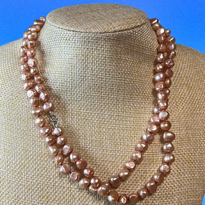 Vintage Single strand baroque freshwater pearl necklace with a 925 Sterling silver clasp. 30”