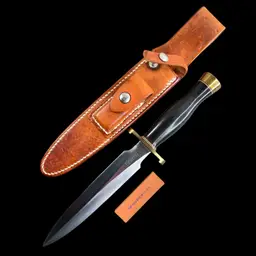 1988 Vintage Randall Collectible Hunting Knife. Model #2 Style. 8" Blade. 13” Overall Length. Leather Sheath With Sharpening Stone Included.
