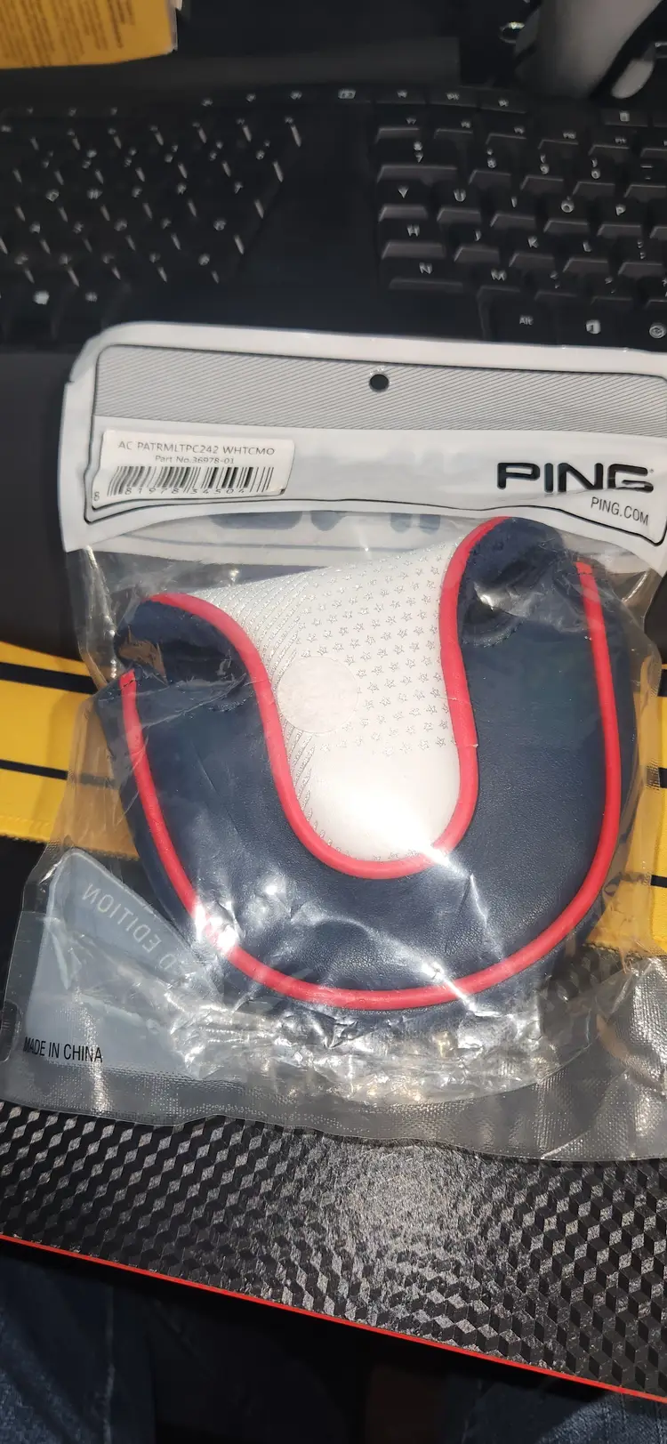 Ping mallet head cover.