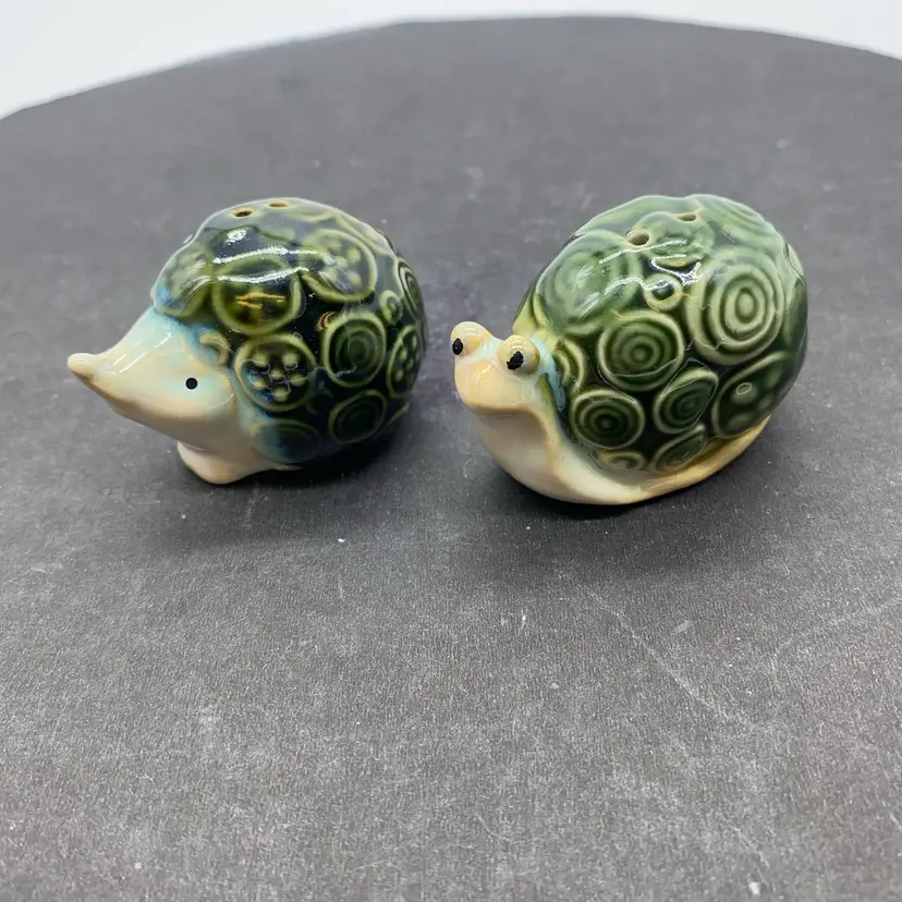 #2002 Vintage ceramic snail and hedgehog salt and pepper shaker set with green glaze.