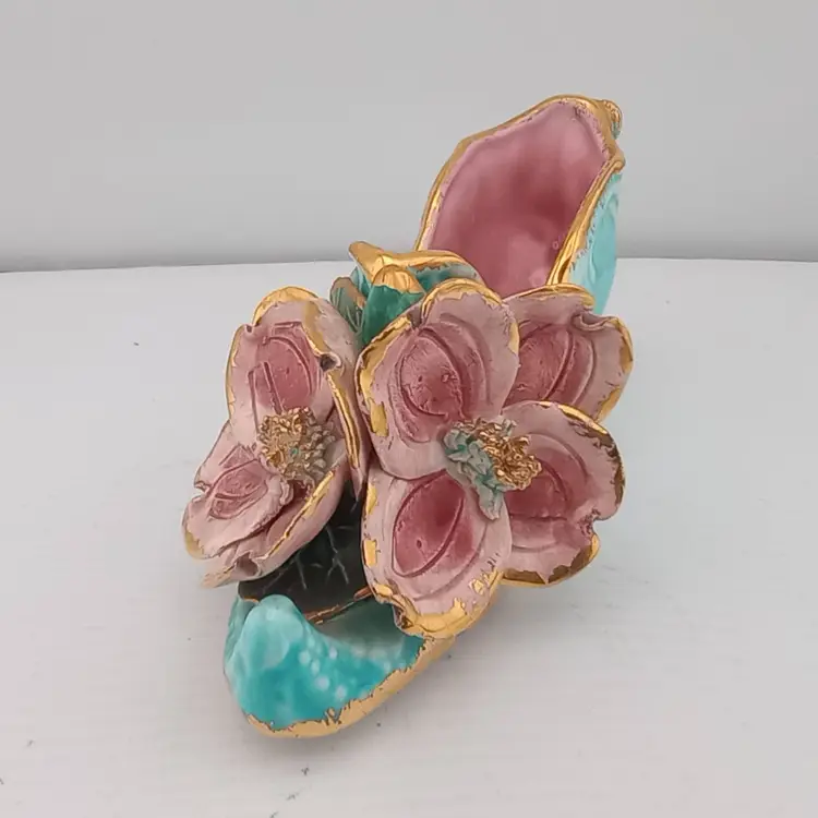 Antique porcelain shoe with flowers