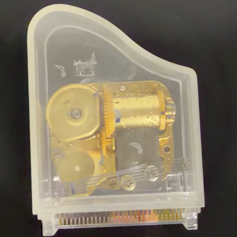 Vintage Sankyo Clear Musical Piano Music Box Plays Memories READ
1.5” T x 3.25” L x 2.5” W