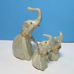 vintage faux wood elephant on chain family figures