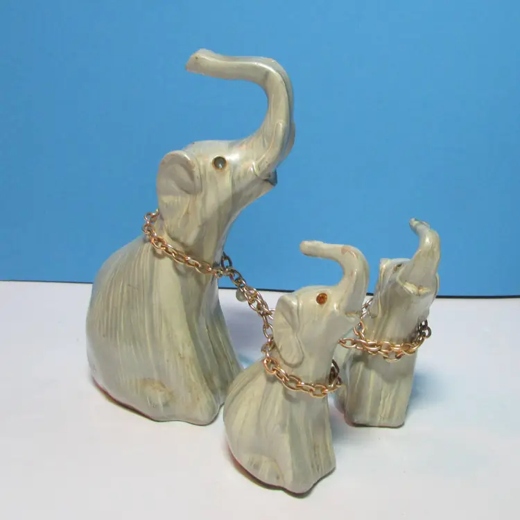 vintage faux wood elephant on chain family figures