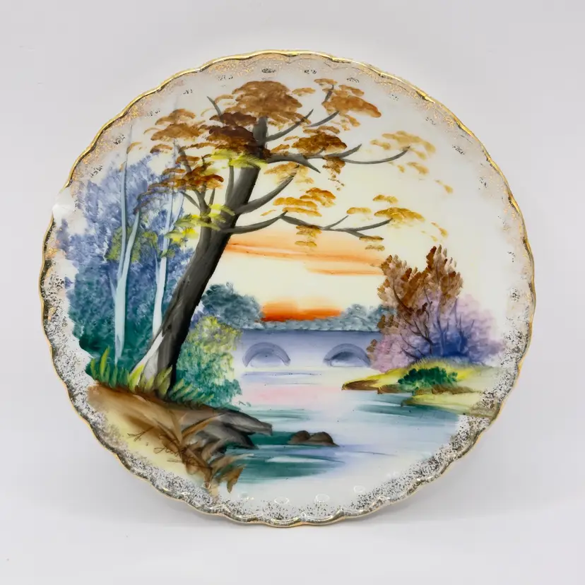 Vintage Hand-Painted Landscape Porcelain Plate, Scenic River and Bridge Design, Signed A. Tubor, By Ucagco, Made in Japan