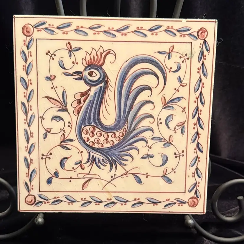 Vintage Portuguese rooster tile features traditional blue and white folk art