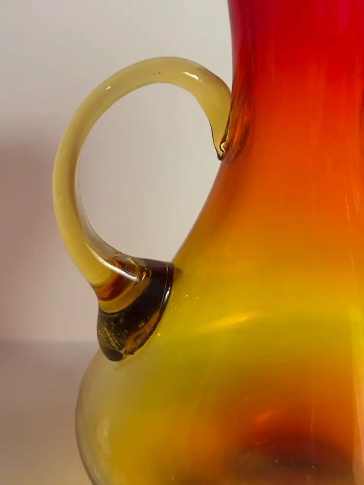 Mid-century modern amberina handled glass vase. Similar To Blenko