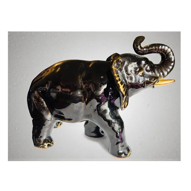 Vintage MCM Ceramic Black with Gold Trim Hand Painted Trunk Up Elephant Figurine - Red Clay - Made In Japan - 7”
x 5” x 2.75” - VGVC
