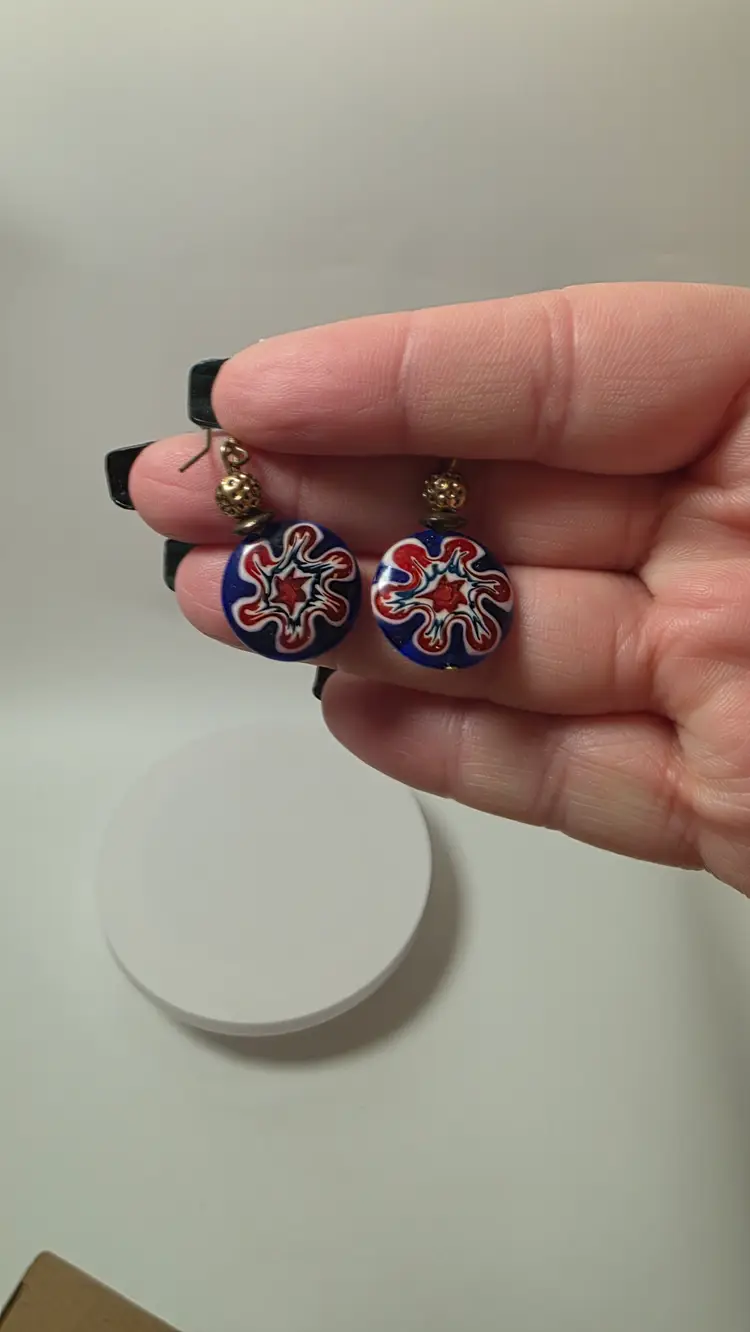 Murano Style Millefiori dangle earrings featuring a red, white, and blue floral
