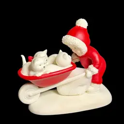 Figurine 2001 Dept 56 Snowbabies "Kitten Courier" With Box #67515 Snowbabie Pushing Three Kitties In A Red Wheel Barrel Bisque Porcelain NIB
4-1/4” T x 4-3/4” L x 2-1/4” W