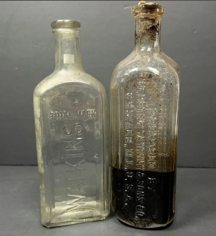 Lot of 2 Glass Antique Medical Tonic Bottles 7.5" & 8"