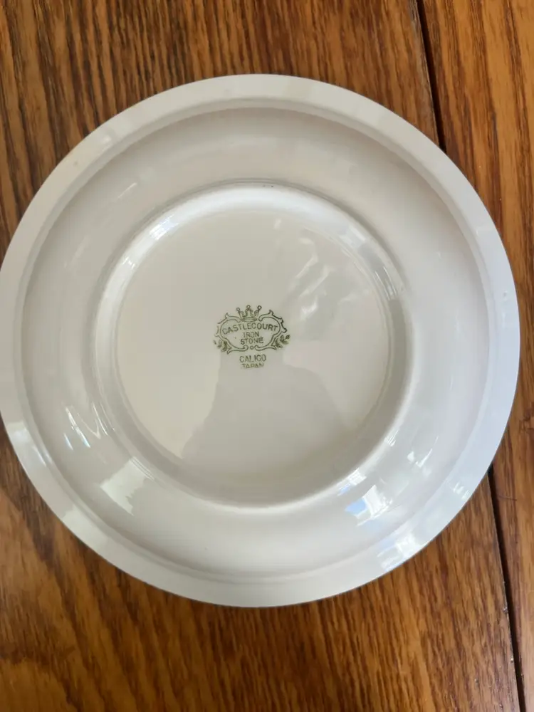 Blue and white Castle Court Iron Stone  ceramic bowl with floral pattern. Stamped From Calico Japan 9 “  X3”