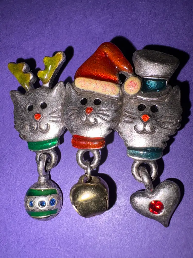 Vintage AJMC Signed 3-Cat Christmas Brooch ~ Silver Tone Cats With Dangling Heart, Bell And Ornament ~ Red, Blue & Green Enamel