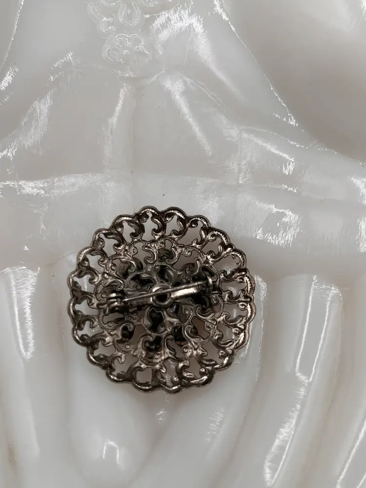 Vintage Blue Rhinestone Starburst Silver Tone Metal Filigree Circle Brooch 1.25”