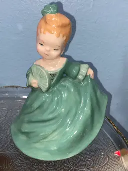 It is a vintage item from the 1960s, made of bone china, ceramic, or porcelain.