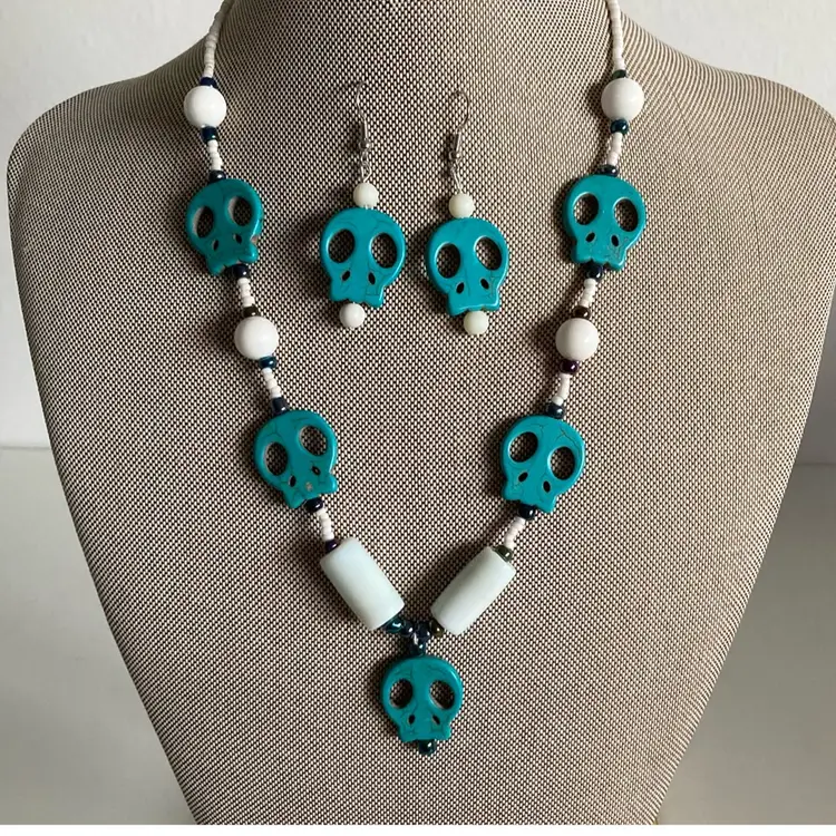 Spooky Carved Stone Skull Necklace With Matching Earrings