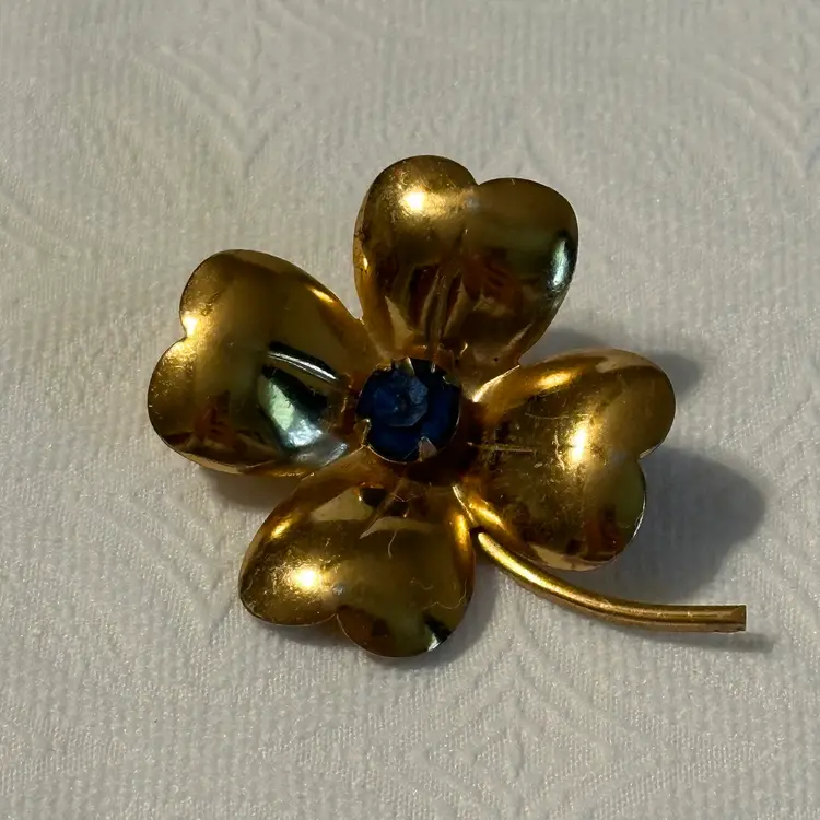 Vintage Gold Tone Four Leaf Clover Blue Glass Center Brooch