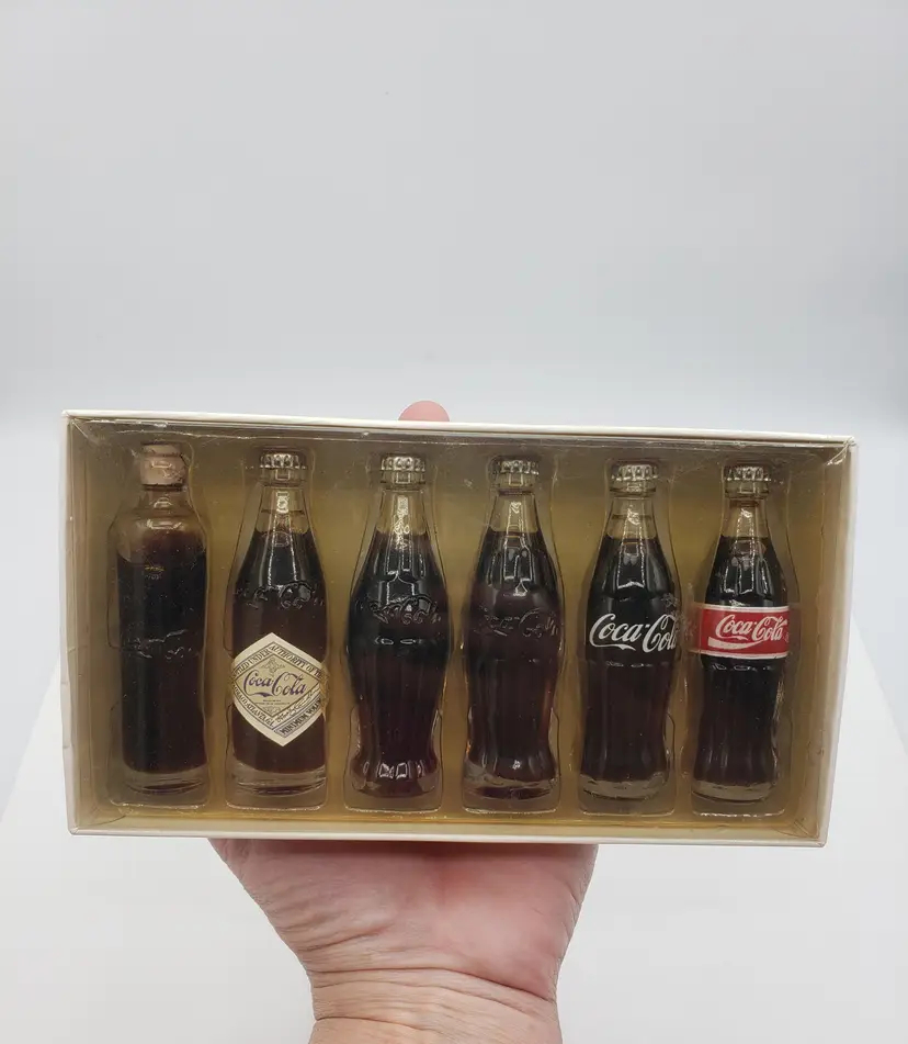Coca-Cola 1998 "Evolution of the Contour Bottle" Set of 6 Mini 3" Coke Decor. These little bottles are adorable!