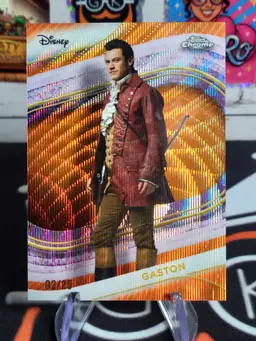 Gaston 2025 Topps Chrome Disney #131 Orange Wave Refractor 2/25