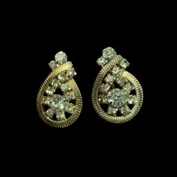Vintage Goldtone Duane Screw Back Earrings. Paisley Shape Textured With Clear GL Rhinestones.