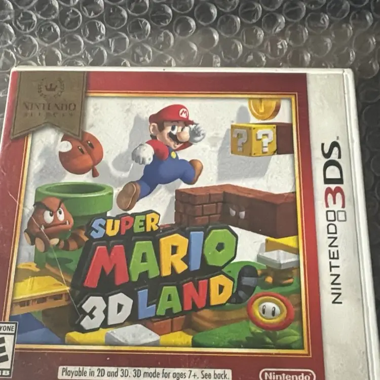 3x Nintendo Games 1x Nintendo 3ds Super Mario Land, 2x Nintendo Ds Flushed Away & Big Brain No Case + Super Mario Maker 3ds CASE ONLY & Nintendo DS 12 Game & 2 Pens Carry Case