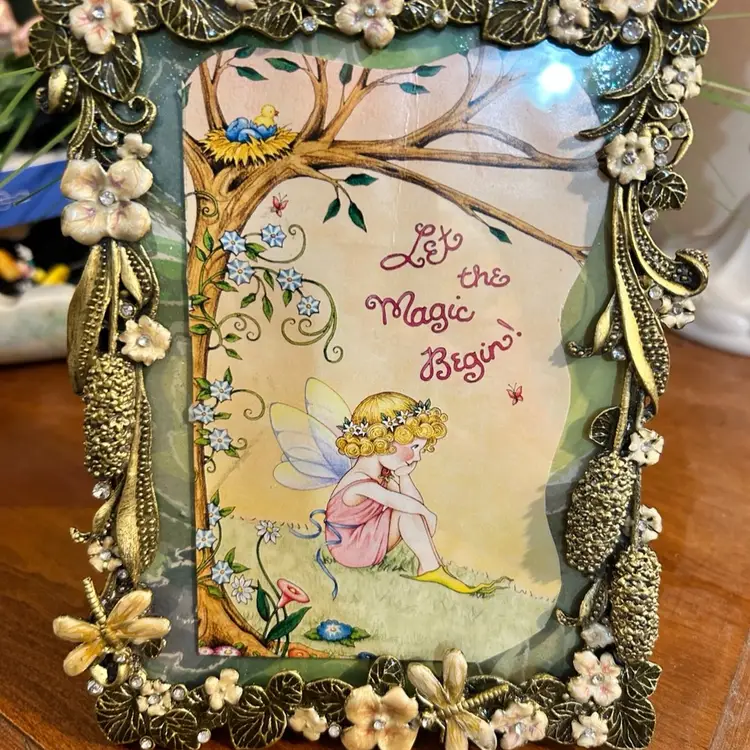 Mary Engelbreit Fairy Card named "Let the Magic Happen"  Framed in Peach Metal Enamel.