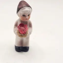 Porcelain Figurine Miniature boy with flowers