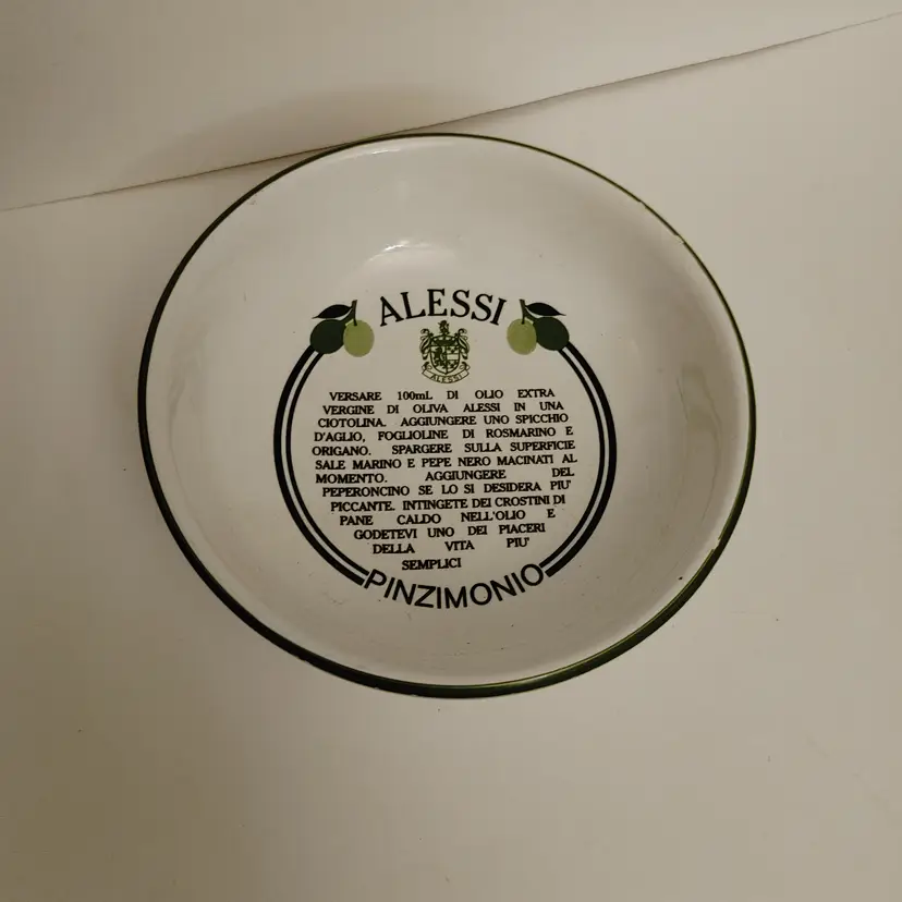 Alessi olive oil dipping bowl. Chip in paint in rim. 5.25 diameter.