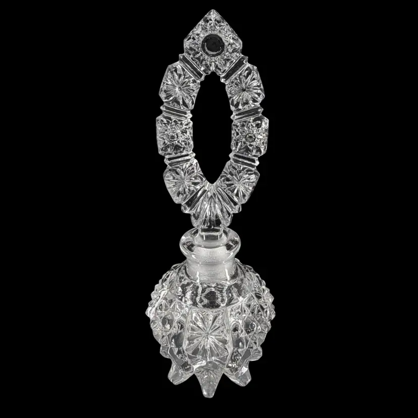 Vintage Art Deco Style Imperial Glass Perfume Bottle with Oversized Starburst Stopper READ
7” T x 2.5” W