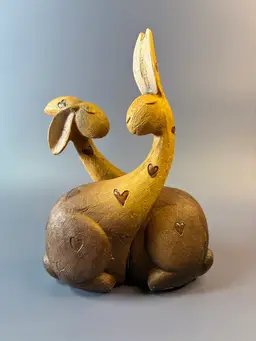 Resin Hugging Rabbit Figurines  6.25” T