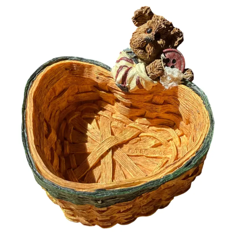 figurine is "Knotley... Loose Buttons," a heart-shaped storage basket from the Boyds Bears Bearstone Collection 2002