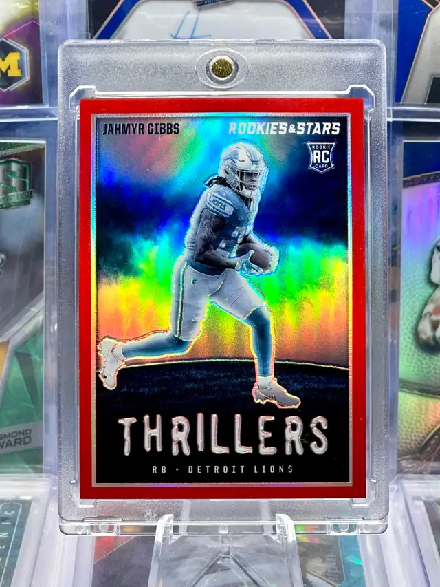 Jahmyr Gibbs 2023 THRILLERS Rookie RC Numbered /99 Red Prizm SP Detroit Lions