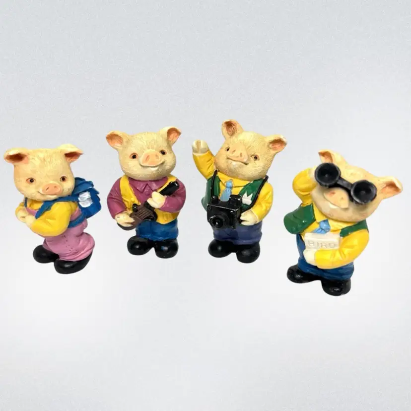 4 Little Piggies 🐷 Figurines. Resin Pigs Enjoying Their Hobbies- Hiking, Photography, Hunting, and Bird Watching. 2-1/8” tall x 1-1/4” tx 1-1/4”.
