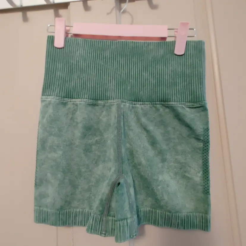 Bottoms- Brand: Zenana. Size L/XL. Fits like medium. NWOT. Green biker shorts. 90% nylon, 10% spandex. No callouts.