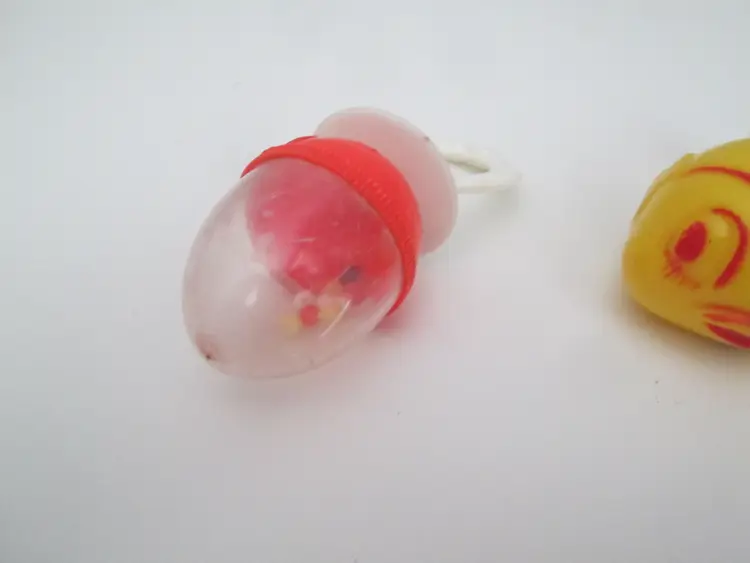 Set of 2 vintage baby rattles fish and egg - for display only