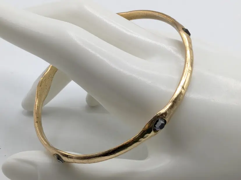 Gold Tone Hammered Bangle Bracelet with Grey Rhinestones