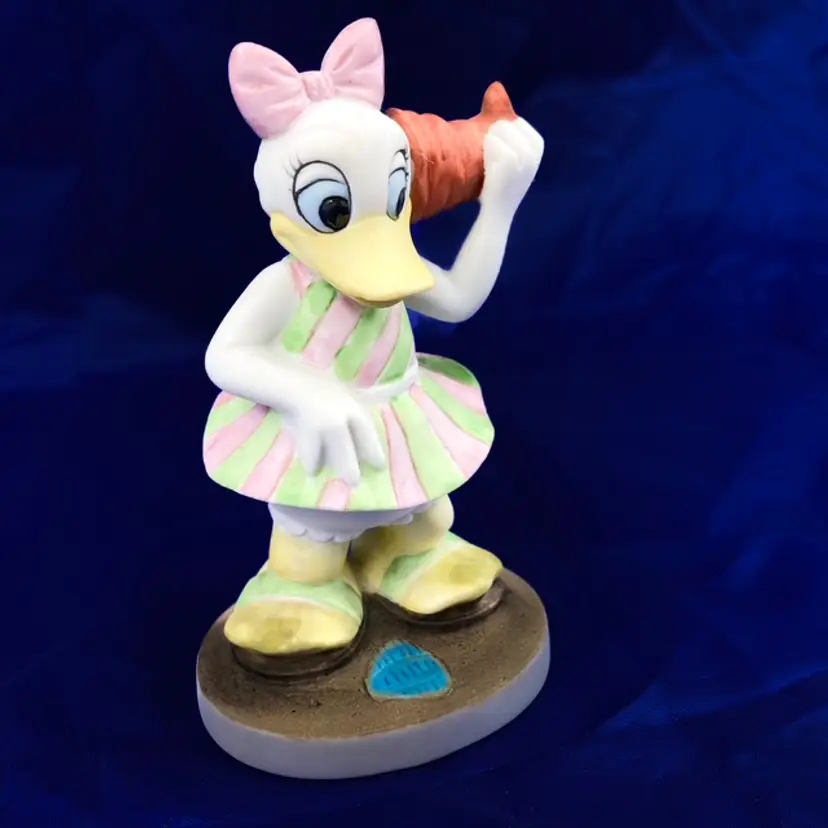 Daisy Duck Bisque Figurine At the Beach Listening to Sea Shells by the Sea Shore