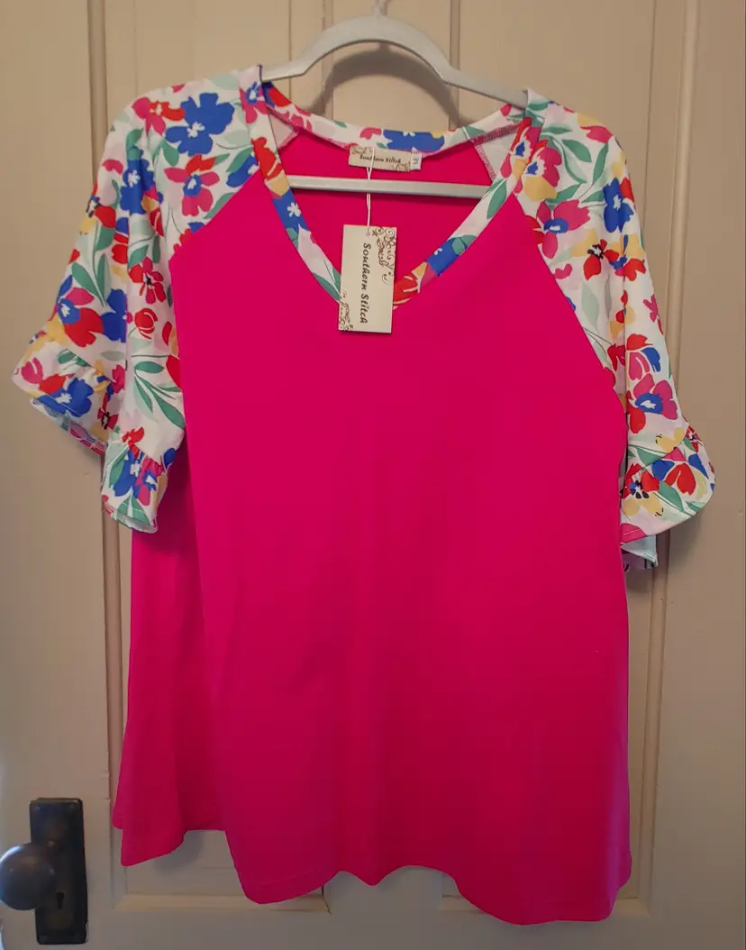 Top- Brand: Southern Stitch. Size Medium. NWT. Bright floral top. Material- 95% polyester, 5% spandex. No callouts.