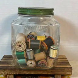 Vintage Jar of spools