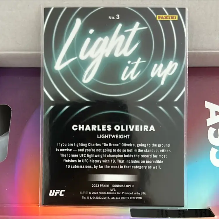 2023 CHARLES OLIVEIRA DO BRONX DONRUSS OPTIC UFC #3 LIGHT IT UP CARD MMA PANINI
