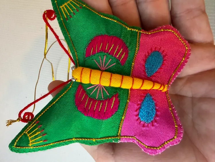 3D Butterfly OrnamentWith Green And Moon Shapes And Clouds Pink On The Wings