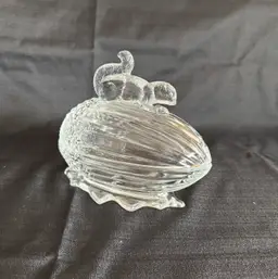 L E Smith Squirrel On Acorn