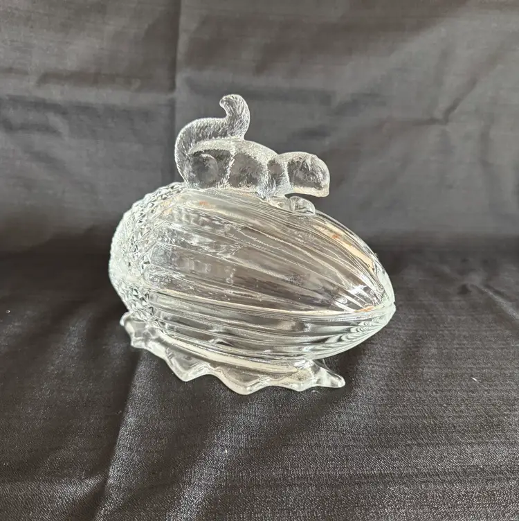 L E Smith Squirrel On Acorn