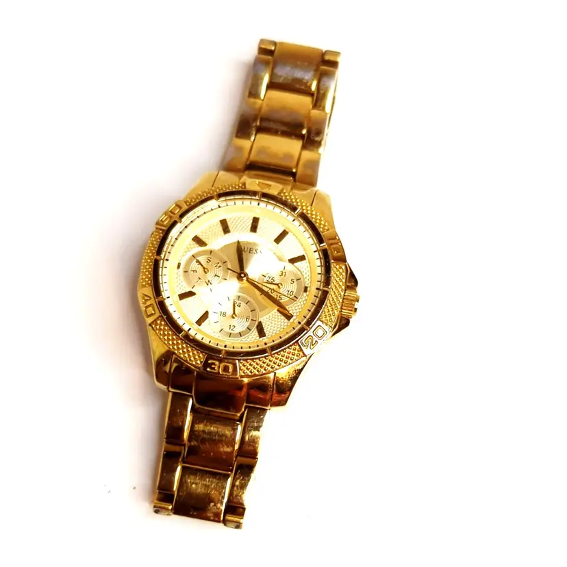 GUESS Womens U0235L5 Dynamic Sports Gold Tone Dial Gold Plated Steel Watch