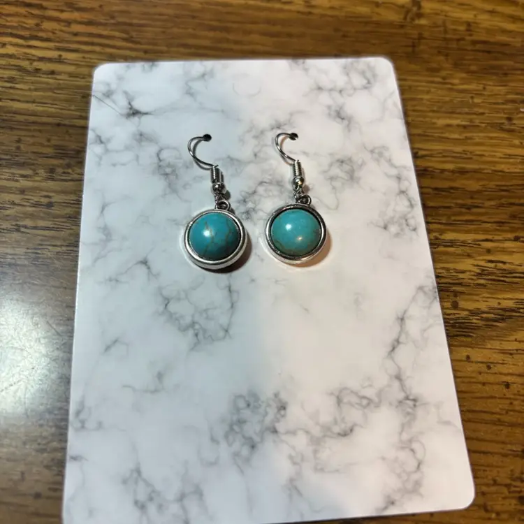 Silver Plated Dangle Earring With A Turquoise Crackle Bead In The Middle