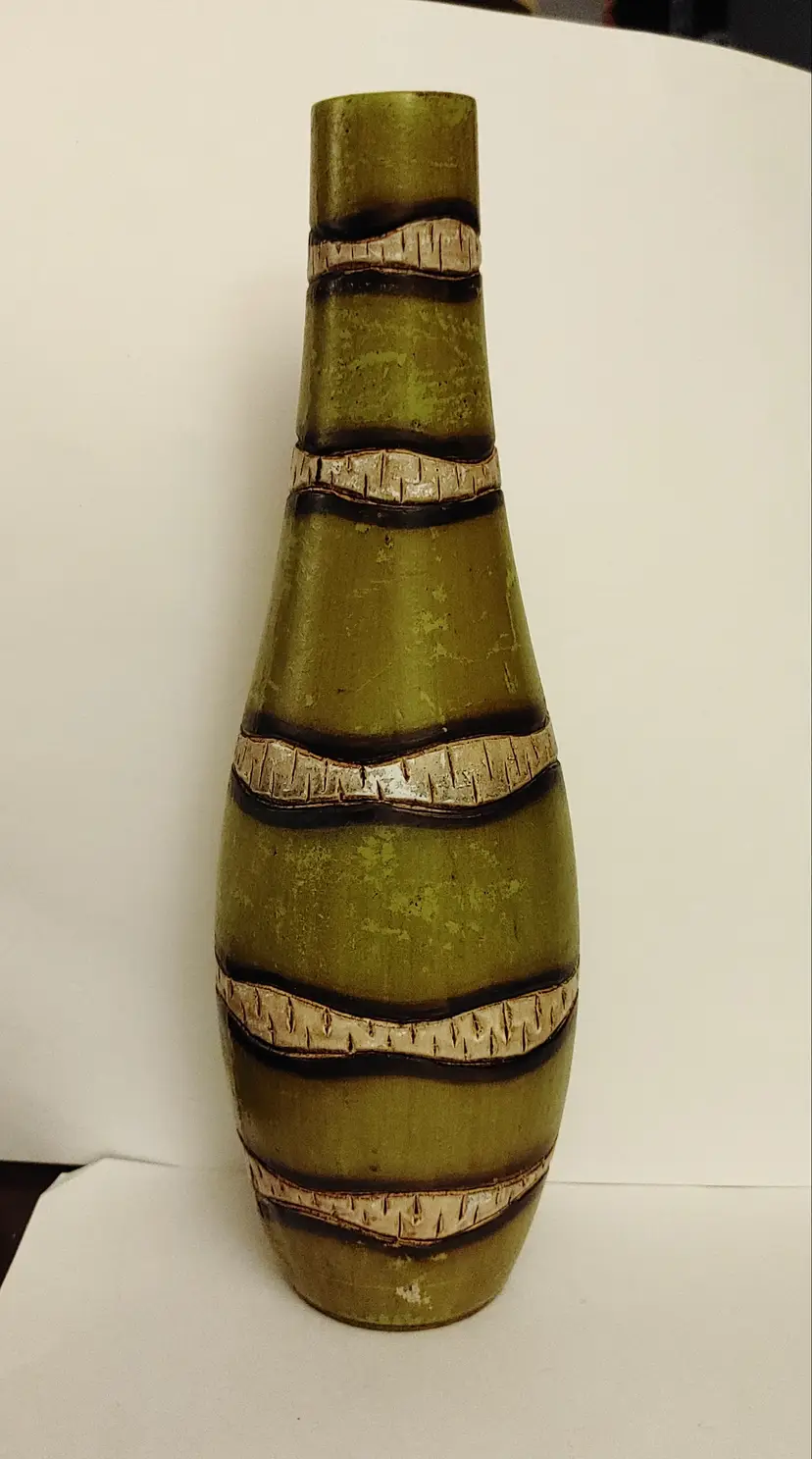 Wood striped vase. Unable to identify. Some paint chips. Wood has carvings. 12 in high.