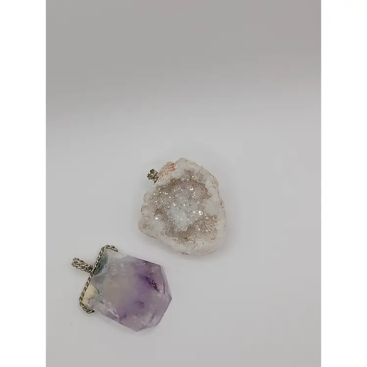 Two Gemstone Pendants, Amethyst and Geode half